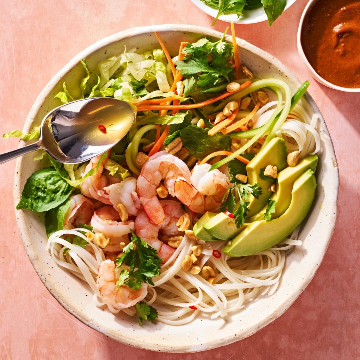 summer roll bowl with rice noodles, shrimp, avocado, and peanuts