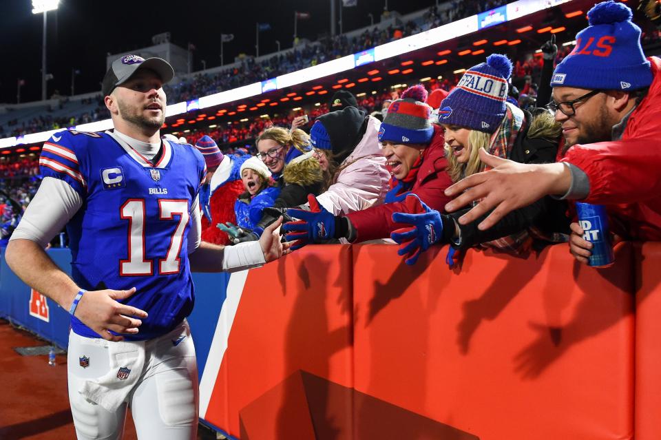 Bills quarterback Josh Allen greets fans following the game against the New York Jets at Highmark Stadium.