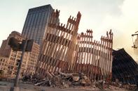 <p>Remains of the façade of 2 World Trade Center is all that stands after Tuesday’s terrorist attack, Wednesday, Sept. 12, 2001, in New York. (Photo: Nick Fanelli/AP) </p>