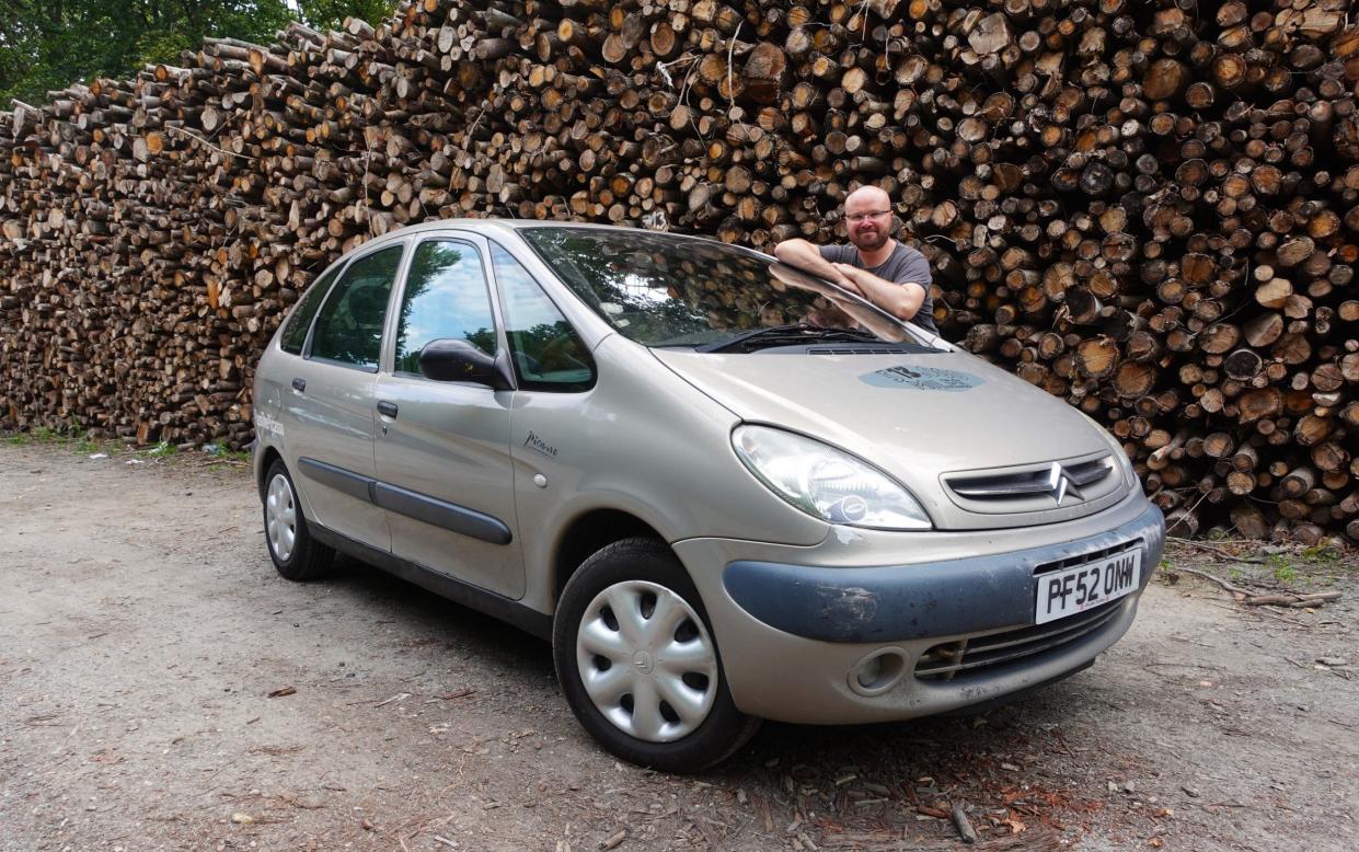 Half a million miles and counting: Alex Robbins with his Citroën