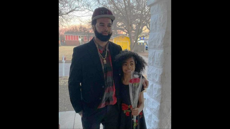 Shavis Tindall poses for a photo with his daughter, A’nyla Tindall, before a daddy/daughter dance in 2020 at Linwood Elementary School.