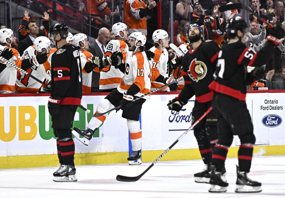 Philadelphia Flyers center Zack MacEwen (17) celebrates his goal against the Ottawa Senators during the second period of an NHL hockey game, Saturday, Nov. 5, 2022 in Ottawa, Ontario. (Justin Tang/The Canadian Press via AP)