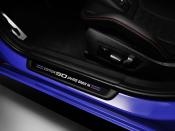 <p>The door sills feature a logo with "Edition 50 Jahre BMW M" and, naturally, red and blue stripes.</p>