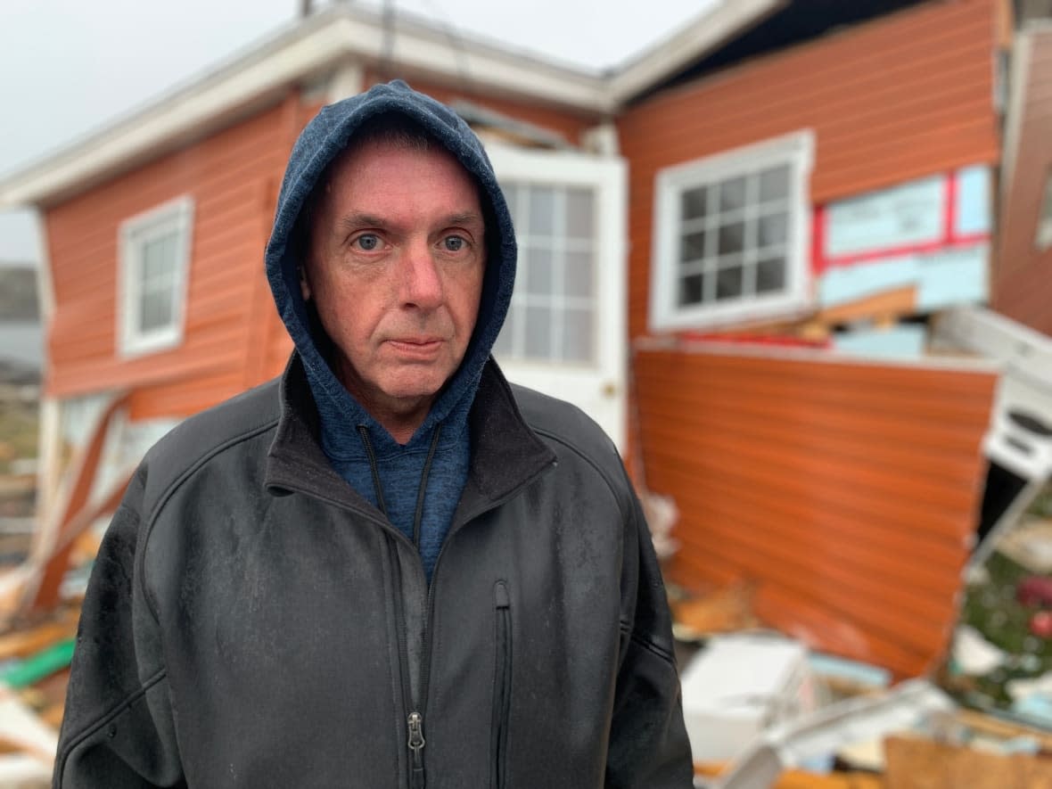 Brian Osmond, better known as 'Smokey,' lost everything he owned aside from his truck. He also nearly lost his life when a strong storm surge swept him away. (Malone Mullin/CBC - image credit)