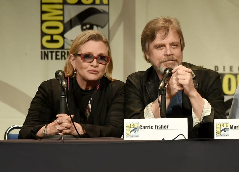 Actors Carrie Fisher (L) and Mark Hamill speak onstage at the Lucasfilm panel during Comic-Con International 2015 at the San Diego Convention Center on July 10, 2015