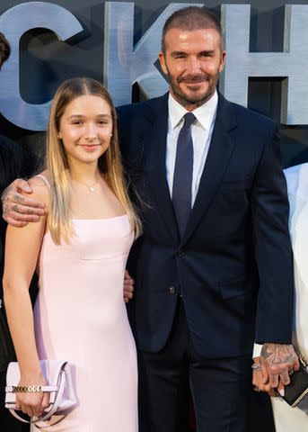 <p>Samir Hussein/WireImage</p> Harper and David Beckham at the 'Beckham' premiere