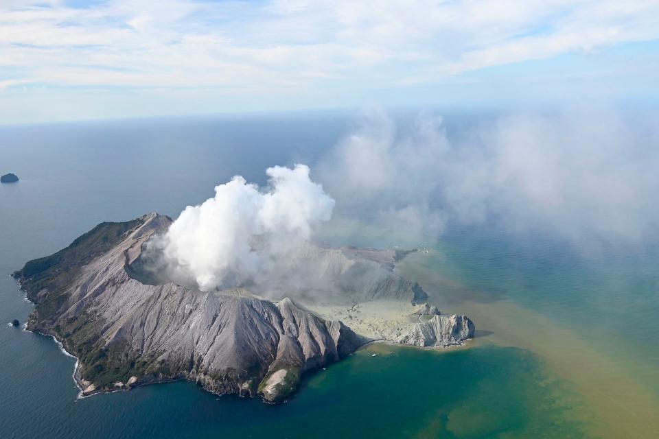 A huge cloud of ash billows into the sky above White Island following the eruption on Monday: AP