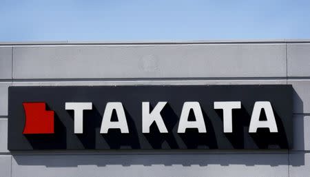 A sign with the TAKATA logo is seen outside the Takata Corporation building in Auburn Hills, Michigan May 20, 2015. REUTERS/Rebecca Cook/File Photo