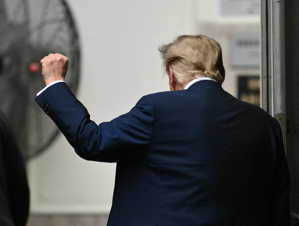 Donald Trump leaves court during a break at his hush-money trial on Thursday.