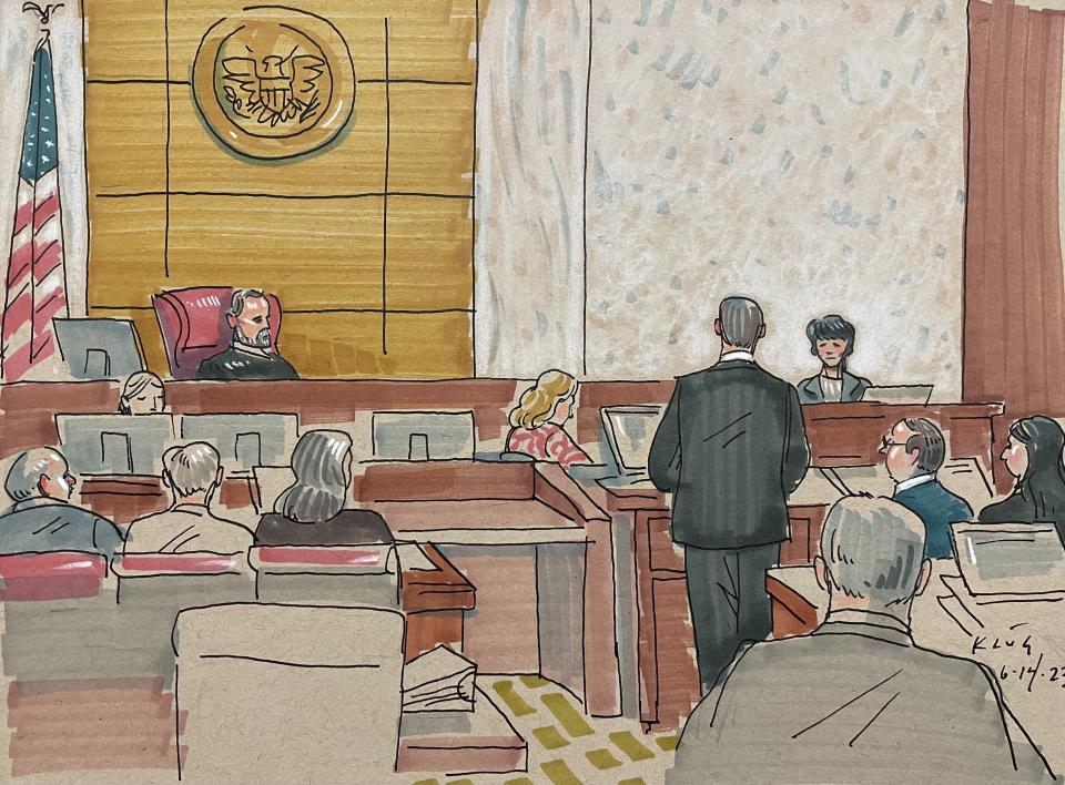 In this courtroom sketch, shooting survivor Andrea Wedner, right, testifies, Wednesday, June 14, 2023, in Pittsburgh, in the federal trial of Robert Bowers. Bowers is accused of shooting to death 11 worshippers in a synagogue more than four years ago, the deadliest antisemitic attack in U.S. history. (David Klug via AP)