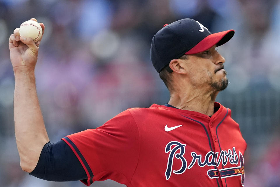 Atlanta Braves pitcher Charlie Morton (50) works against the Pittsburgh Pirates in the first inning of a baseball game Friday, June 28, 2024, in Atlanta. (AP Photo/John Bazemore)