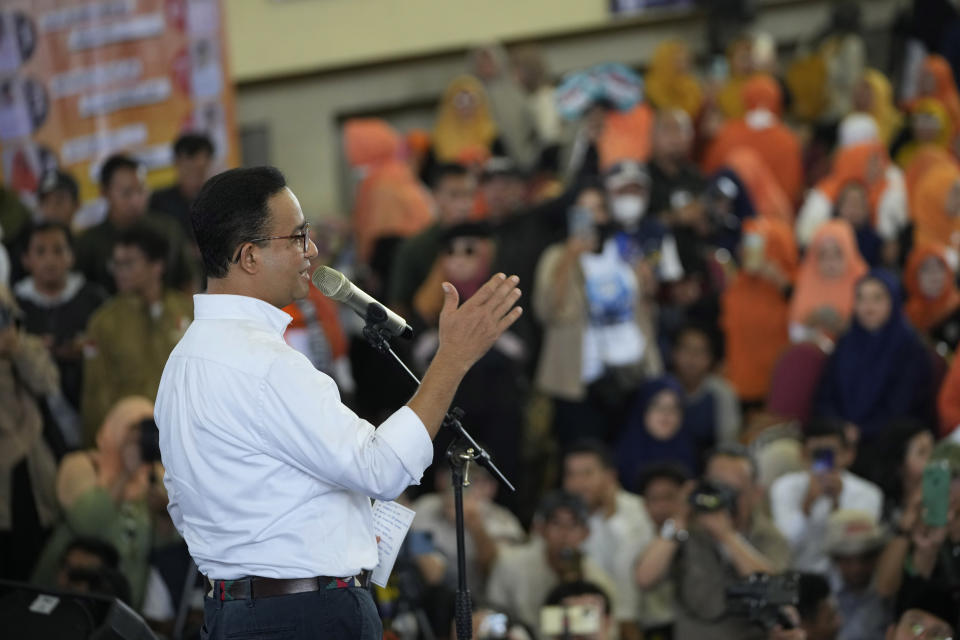 Presidential candidate Anies Baswedan gestures as he delivers a speech during his campaign rally in Jakarta, Indonesia, Tuesday, Nov. 28, 2023. Candidates officially began their campaign for next year's election which will determine who will succeed President Joko Widodo who is now serving his second and final term. (AP Photo/Achmad Ibrahim)