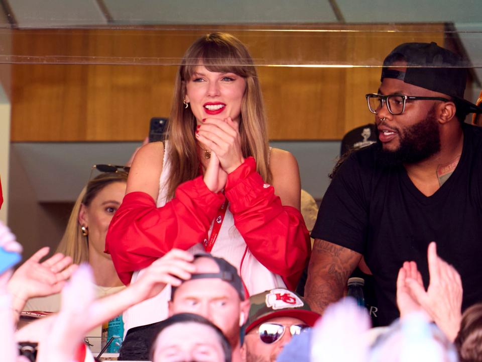 Taylor Swift cheers from a suite as the Kansas City Chiefs play the Chicago Bears at GEHA Field at Arrowhead Stadium