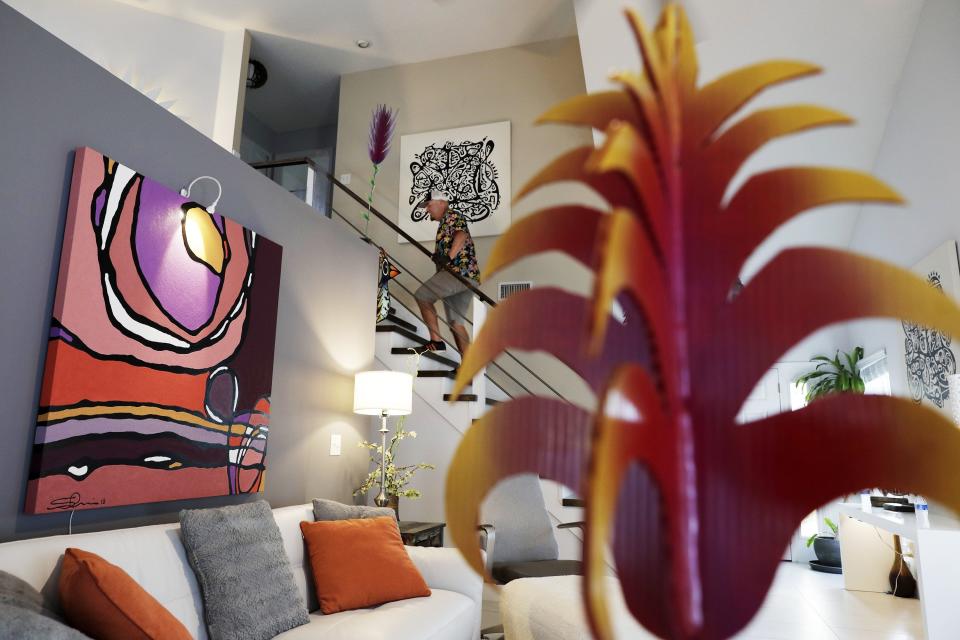 The interior of Scotie Cousin's Atlantic Beach home is filled with a wide range of his artistic work in different mediums.