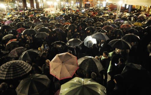 People attend a demonstration in front of a court house in the Northern Spanish Basque town of Barakaldo, on November 9, hours after the death of Amaya Egana. Egana, 53, commited suicide jumping from the balcony of her home before she was going to be evicted