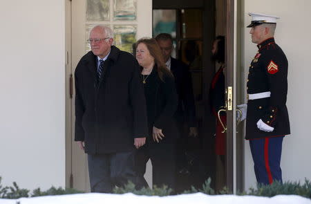 U.S. Democratic presidential candidate Bernie Sanders walks out from the West Wing of the White House to speak to reporters after his meeting with U.S. President Barack Obama in Washington January 27, 2016. REUTERS/Kevin Lamarque