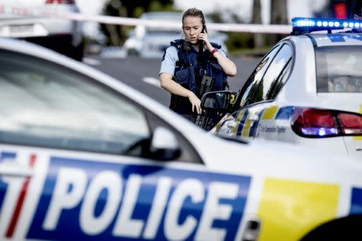 Officer at the scene of the shooting in a residential neighbourhood in Auckland. Source: AFP