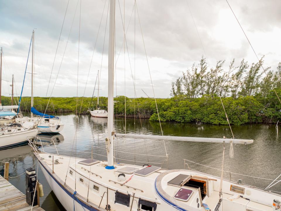 A boat at a dock on a cloudy day