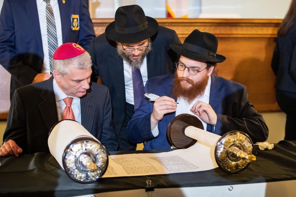 The final scribing of the new Torah Scroll for Chabad Lubavitch of the Panhandle, FSU was done inside the Florida Historic Capitol building on Tuesday, Oct. 10, 2023.