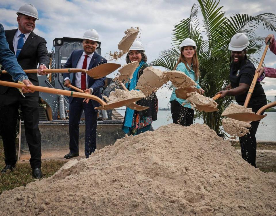 Roy Coley, head of Miami-Dade Water and Sewage Dept., left, Miami-Dade Commissioner Keon Hardemon, Mayor Daniella Levine Cava, and Mayor Omarr C. Nickerson, far right, break ground on the Connect 2 Project. On Thursday, January 27, 2022 Miami-Dade County Mayor Daniella Levine Cava launched Connect 2 Protect, a multi-year, countywide program that provides sanitary sewer service to residents with septic tank systems just northeast of the Shore Crest neighborhood.