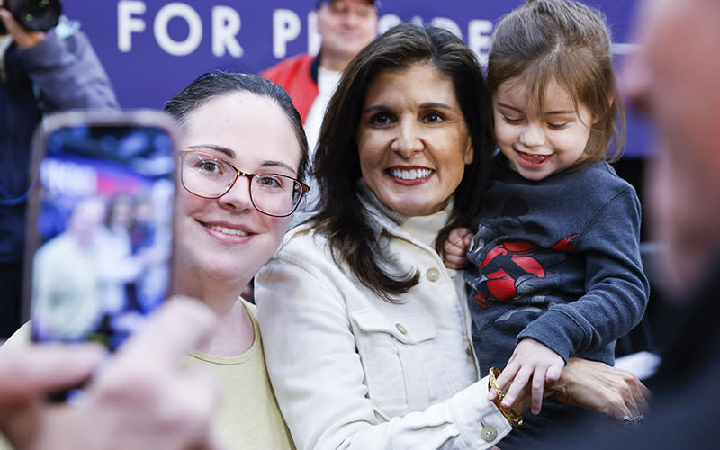 Republican presidential candidate Nikki Haley poses for a photo