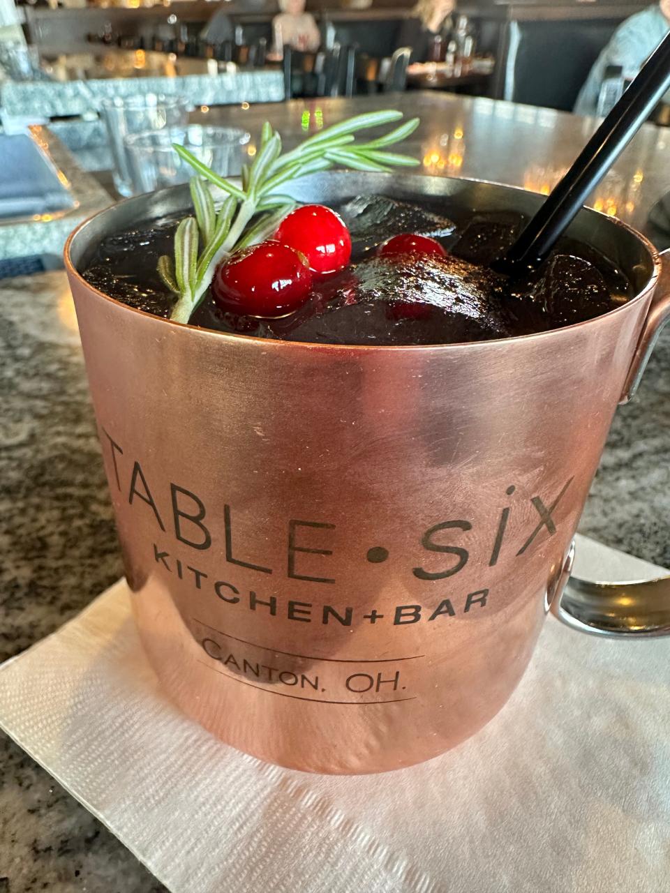 The merry berry mule at Table Six in Jackson Township is infused with house-made rosemary syrup.