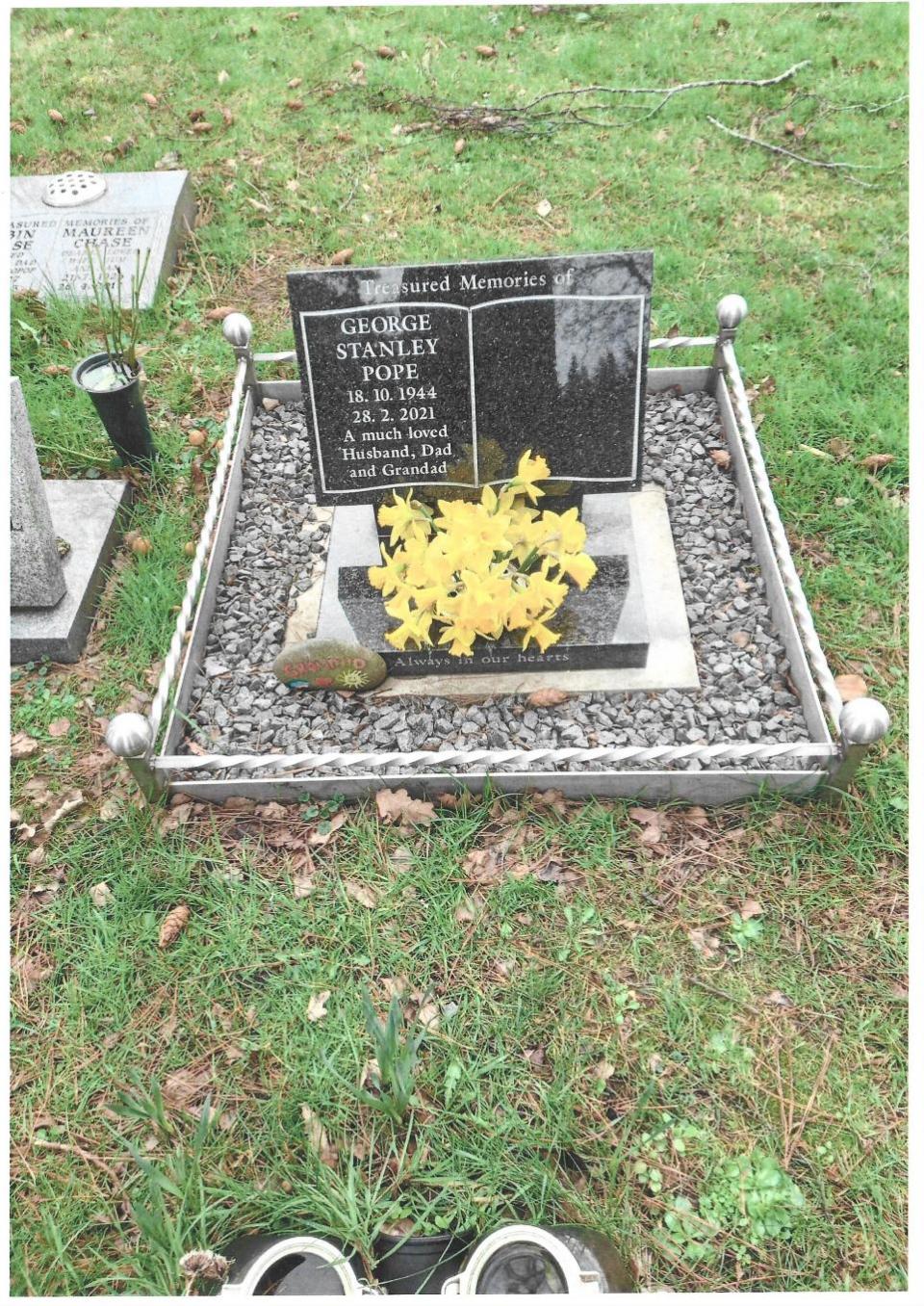 Eastern Daily Press: George Pope's grave at Creake Road Cemetery in Fakenham, with the surround which the town council have asked his son, Steve Pope, to remove