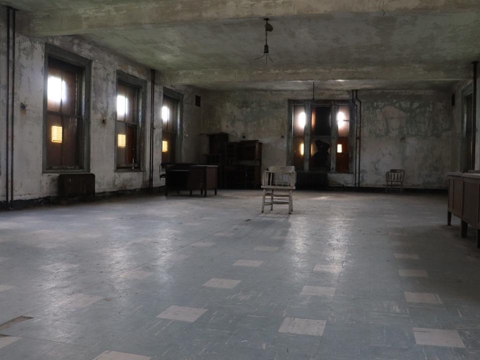 a large, empty ward in ellis island hospital