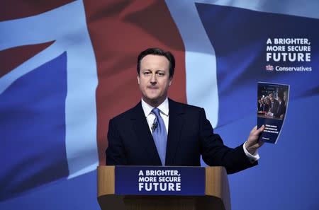 Britain's Prime Minsiter David Cameron launches the Conservative Party's election manifesto in Swindon, western England, April 14, 2015. REUTERS/Toby Melville