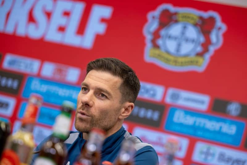 Bayer Leverkusen coach Xabi Alonso speaks during a press conference in Leverkusen. Christoph Reichwein/dpa