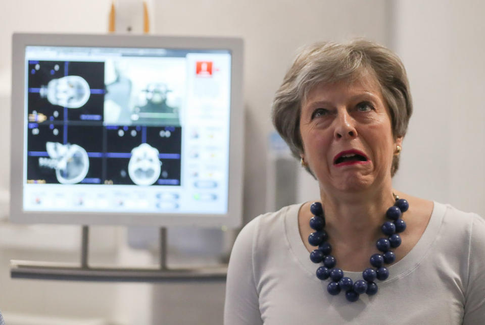 Theresa May visits hospital to announce new funding and research into prostate cancer