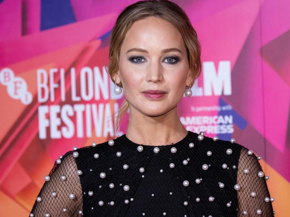 Jennifer Lawrence poses for photographers upon arrival for the premiere of the film "Causeway" during the 2022 London Film Festival in London in October 2022.