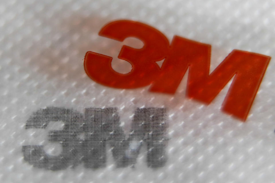 3M logos are seen on a face mask and its packaging in this illustration photo taken in Krakow, Poland on January 11, 2022. (Photo by Jakub Porzycki/NurPhoto via Getty Images)