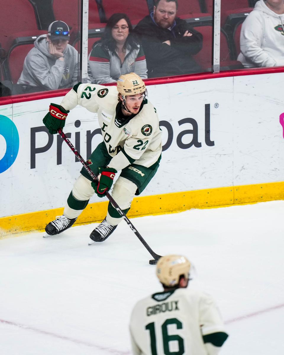 Iowa Wild defensemen Ryan O’Rourke (22) looks to move the puck during the game against Coachella Valley Firebirds.