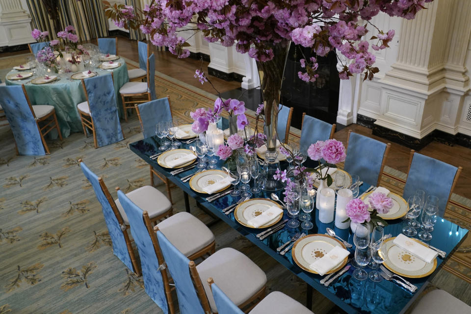 Table settings are displayed during a media preview, Monday, April 24, 2023, in advance of Wednesday's State Dinner with South Korea's President Yoon Suk Yeol at the White House in Washington. (AP Photo/Susan Walsh)