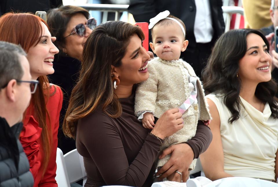 Priyanka Chopra and daughter Malti Marie Chopra Jonas attend a ceremony honoring The Jonas Brothers with a star on The Hollywood Walk of Fame on Jan. 30.