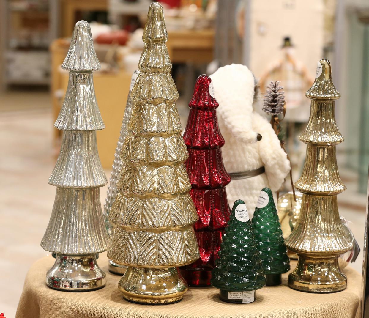 Simple and elegant figurines inspired by Scandinavian design are poplar for the 2022 Christmas holidays.  Dillard's Home Store Mall St. Matthews.