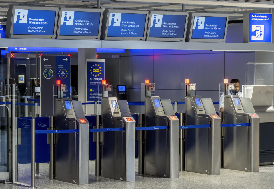 Security gates are closed at the airport in Frankfurt, Germany, Thursday, March 7, 2024. German Lufthansa airline and the airport security staff are on a strike causing the cancellation go most of the flights. (AP Photo/Michael Probst)