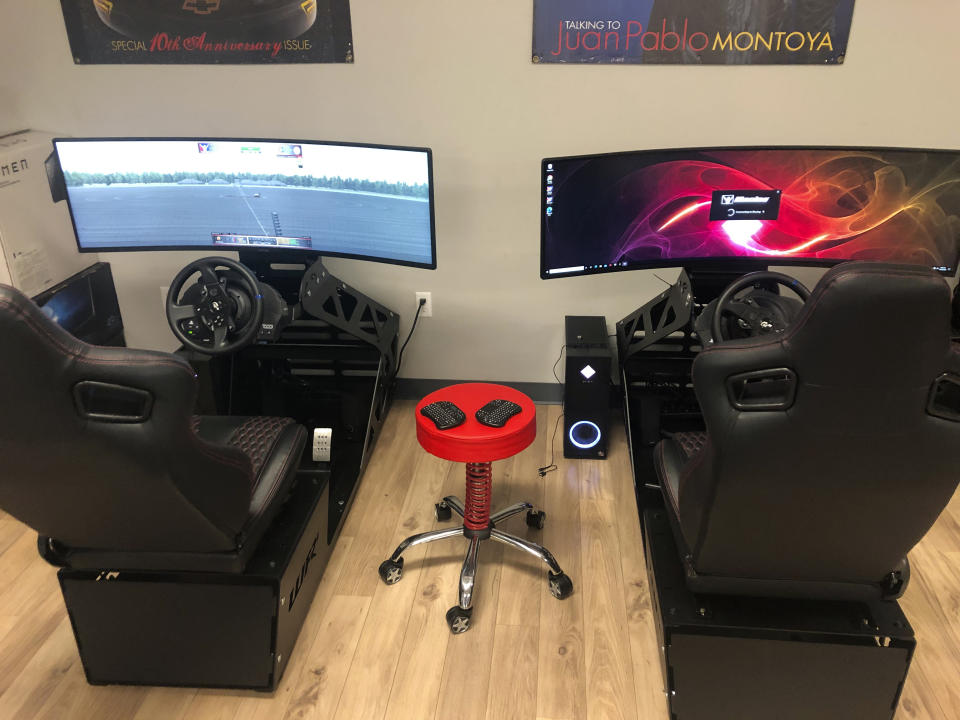 Race simulators donated by former NASCAR driver Kyle Larson are seen at the Urban Youth Racing School, Friday, Oct. 30, 2020, in Philadelphia. The school has made it its mission to introduce inner-city youngsters, most of them black, to the motorsports world. (AP Photo/Dan Gelston)