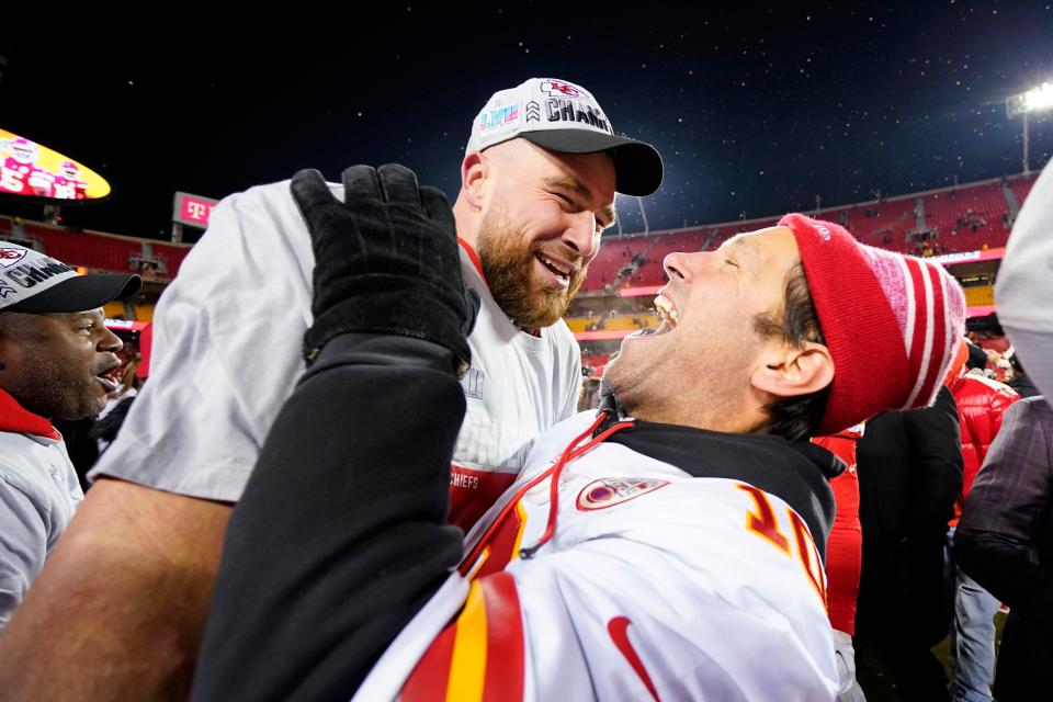 Kansas City Chiefs tight end Travis Kelce, left, celebrate with actor Paul Rudd after the Chiefs won last year's AFC championship game on Jan. 29, 2023.