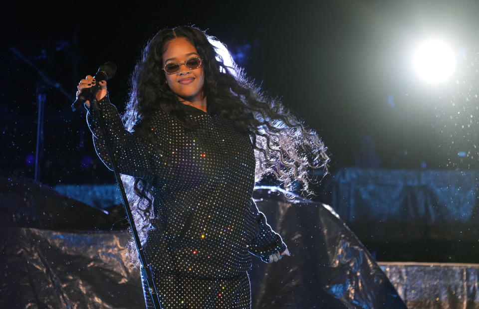 H.E.R. performs during her opening set for Coldplay at the Rose Bowl, Saturday, Sept. 30, 2023, in Pasadena, Calif. (AP Photo/Chris Pizzello)