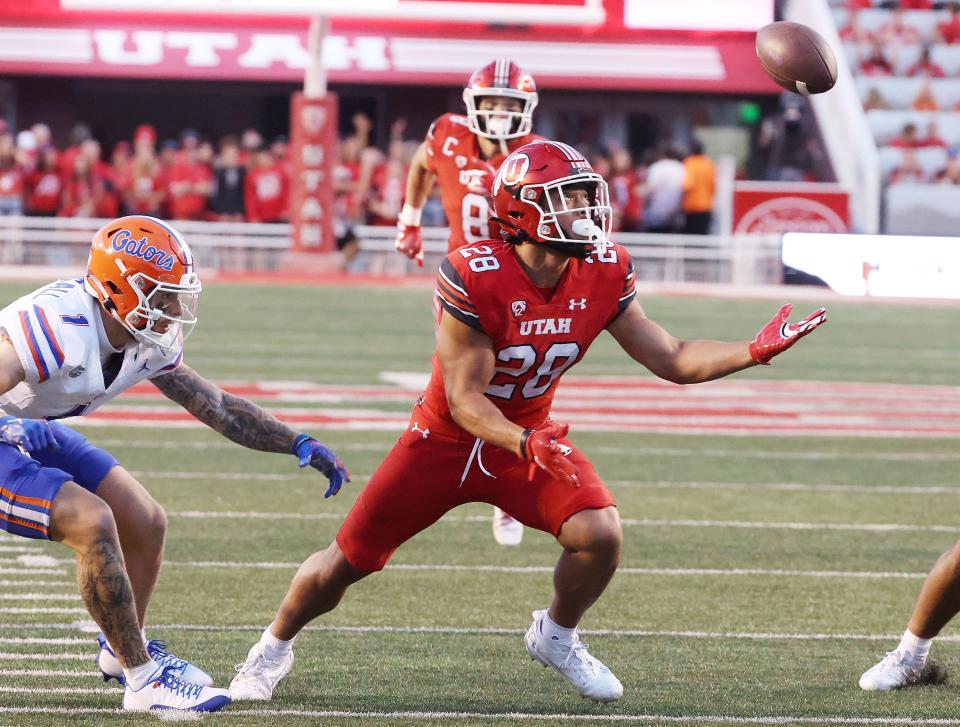 Utah Utes safety Sione Vaki (28) intercepts the ball against the Florida Gators in Salt Lake City on Thursday, Aug. 31, 2023 during the season opener. Utah won 24-11. | Jeffrey D. Allred, Deseret News