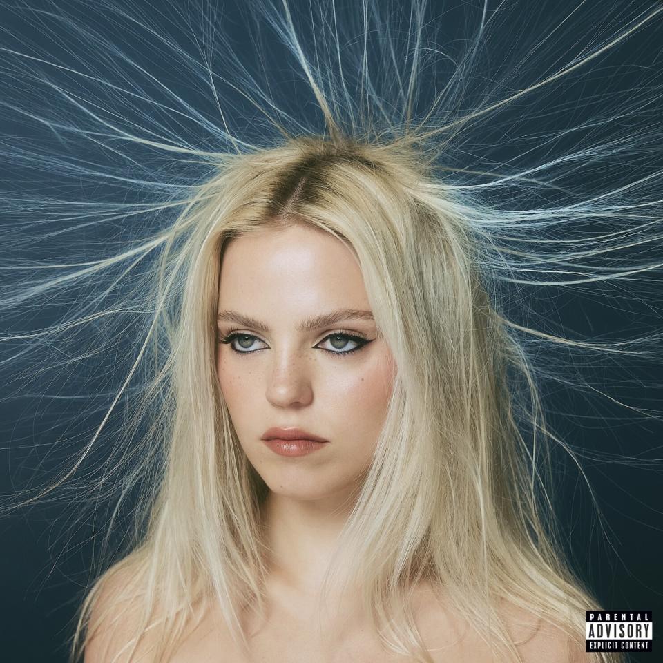 Album cover for "Snow Angel" by Reneé Rapp, showing her hair with electric static