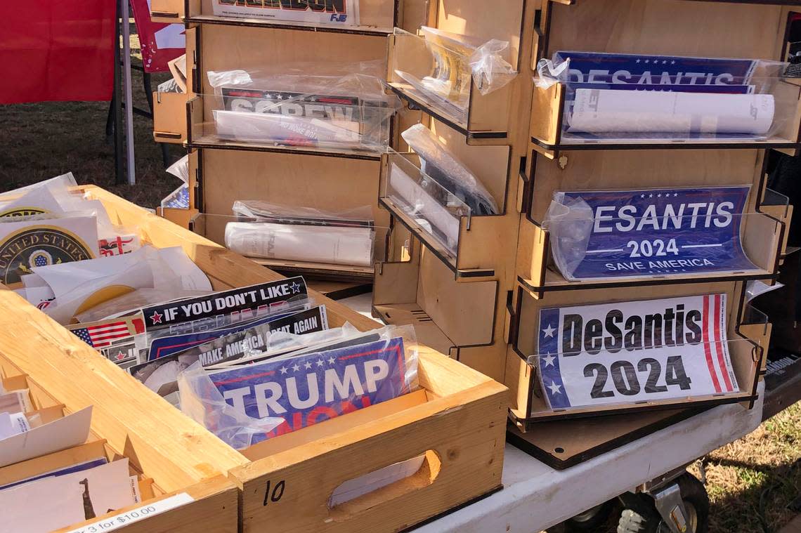 Bumper stickers supporting Florida Gov. Ron DeSantis on sale at former President Donald Trump’s rally in Conroe, Texas, Saturday, Jan. 29, 2022. At Trump’s rally, there were signs of change. Next to the Trump hats, shirts and flags sat a collection of Ron “DeSantis 2024” bumper stickers. The vast majority of those interviewed at Trump’s rally enthusiastically cheered the prospect of another Trump run. But there were some who conceded that, perhaps, there might be a better option. (AP Photo/Jill Colvin)