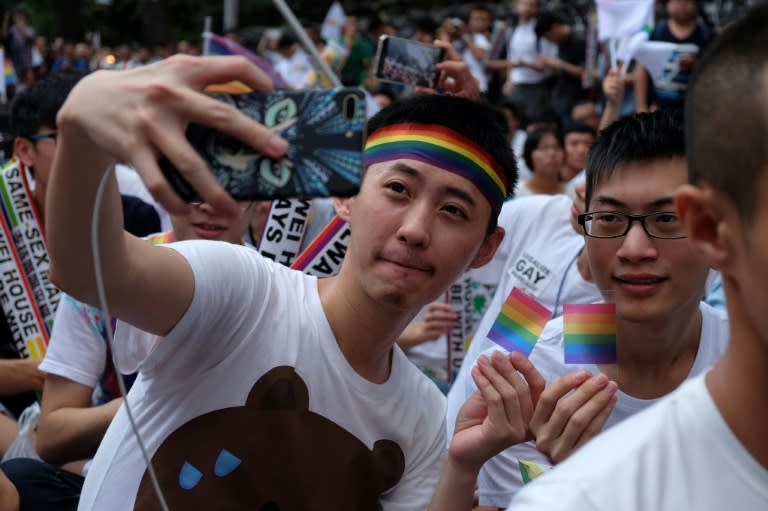 Crowds of pro-gay marriage supporters cheered, hugged and wept in Taipei as the top court ruled in their favour