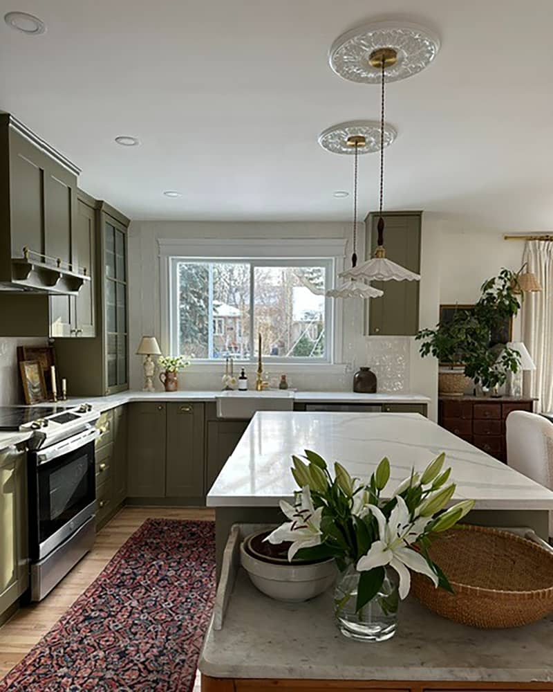 Pendant lights hanging over kitchen island.