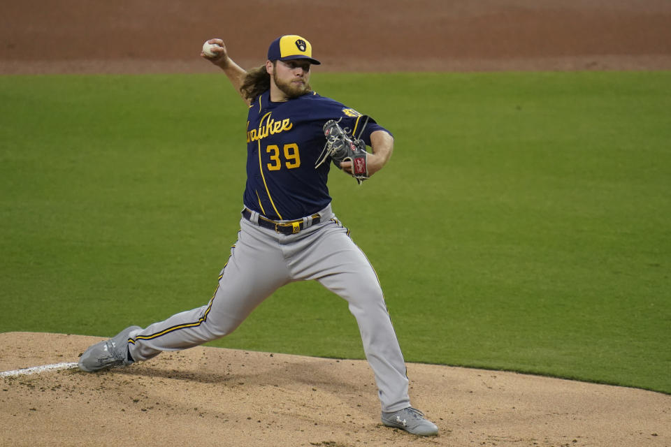 Milwaukee Brewers starting pitcher Corbin Burnes works against a San Diego Padres batter during the first inning of a baseball game Tuesday, April 20, 2021, in San Diego. (AP Photo/Gregory Bull)