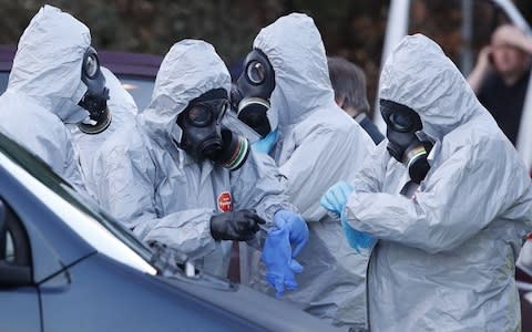 Emergency workers wear protective equipment in Salisbury at one of the scenes of investigation of the nerve agent attack - Credit: Peter Macdiarmid/LNP