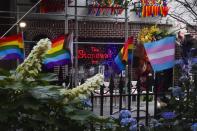 Flags affirming LGBTQ identity dress the fencing surrounding the Stonewall National Monument, Wednesday, June 22, 2022, in New York. Sunday's Pride Parade wraps a month marking the anniversary of the June 28th, 1969, Stonewall uprising, sparked by a police raid on a gay bar in Manhattan and a catalyst of the modern LGBTQ movement. (AP Photo/Bebeto Matthews)