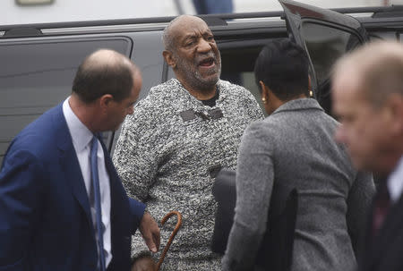 Bill Cosby arrives for his arraignment on sexual assault charges at the Montgomery County Courthouse in Elkins Park, Pennsylvania December 30, 2015. REUTERS/Mark Makela
